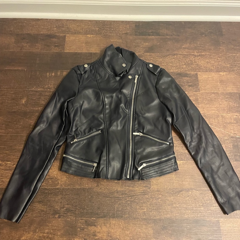 Black tight fitted leather jacket